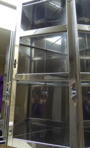 verspiegelter Eckschrank
