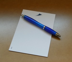 Notizblock und Kugelschreiber