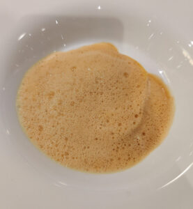Hummerravioli und Bisque