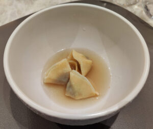 Wild Tortelli in Brühe