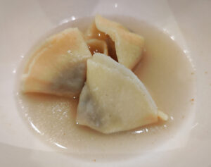 Wild Tortelli in Brühe